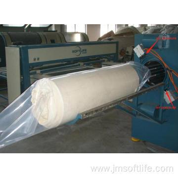 Mattress roll packing machine